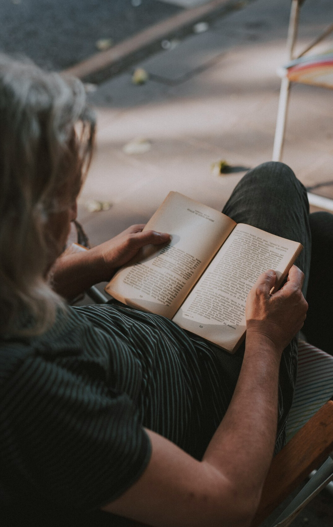 person reading mystery book