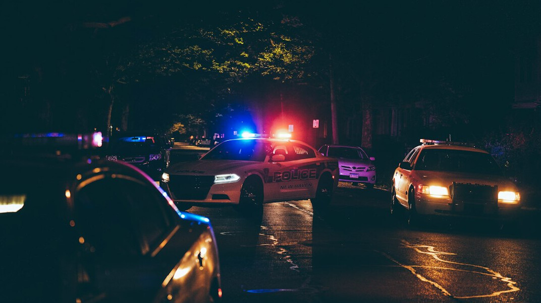detective investigating crime scene